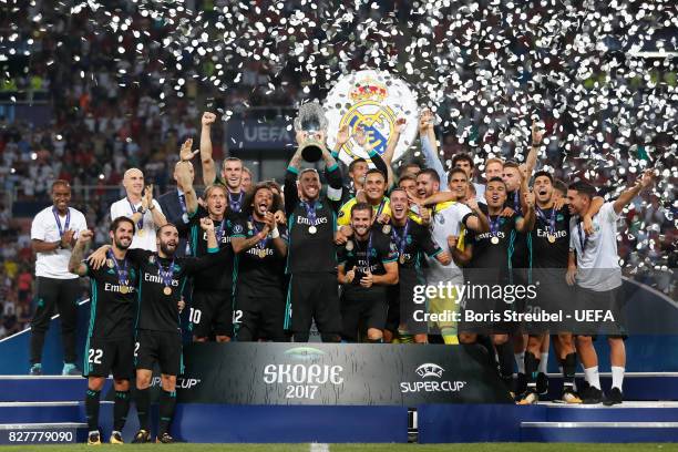 Sergio Ramos of Real Madrid lifts The UEFA Super Cup trophy after the UEFA Super Cup final between Real Madrid and Manchester United at the Philip II...