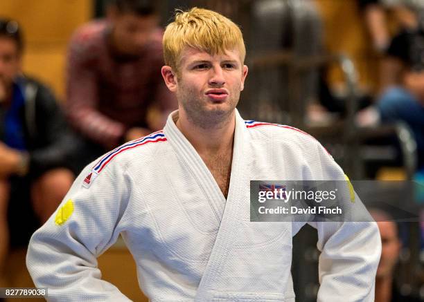 Chris Skelley, who won the u100kg gold medal the previous day, watches as his team mates lose the bronze medal to the Turkish team. As the last...