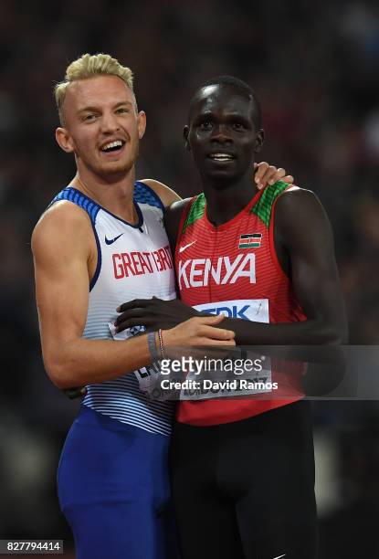 Kyle Langford of Great Britain and Kipyegon Bett of Kenya, bronze, react after the Men's 800 metres final during day five of the 16th IAAF World...