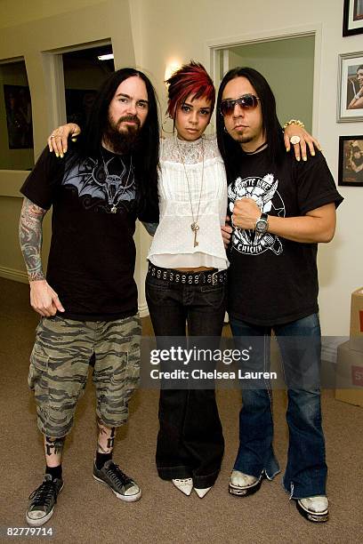 Musician Blasko of Ozzy Osbourne, Marketing Director of Ed Hardy Watches Luci Suicide, and Musician Sin Quirin of Ministry pose at the Ed Hardy...