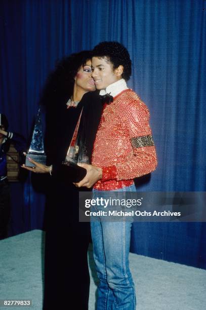 Michael Jackson and Diana Ross backstage with their American Music Awards. Michael won for Favorite Male Vocalist - Soul and R&B, and Favorite Album...