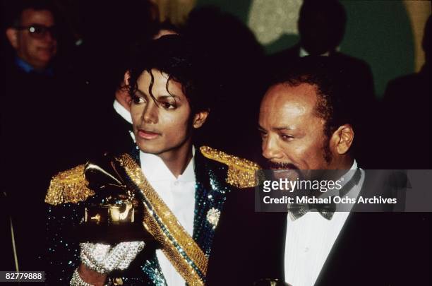 Michael Jackson and his producer Quincy Jones pose with their Grammys on February 28 1984 at the 26th annual Grammy Awards in Los Angeles, California.