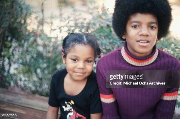 Michael Jackson and his sister Janet pose for a photo at their Hollywood Hills home on December 18 1972 in Los Angeles, California.