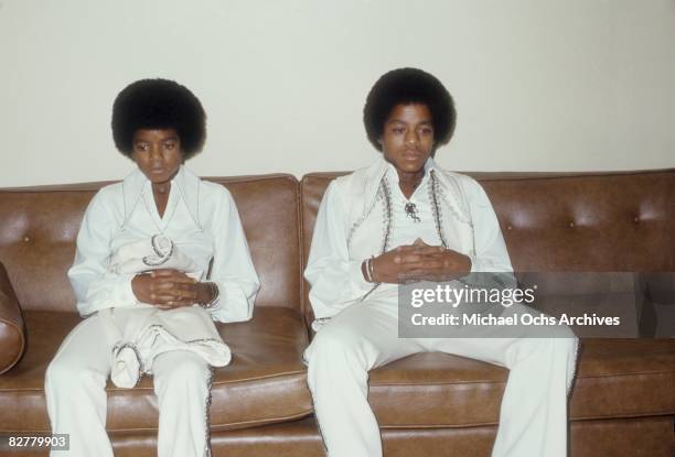 Michael Jackson and Marlon Jackson relax backstage before a concert on August 26 1972 at the Forum in Inglewood, California.