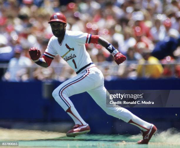 Ozzie Smith of the St. Louis Cardinals runs to second base against the Cincinnati Reds during a MLB game on June 2, 1985 in Busch Stadium II in St....