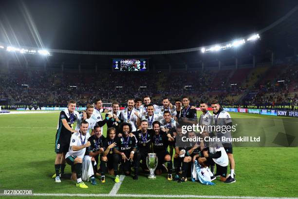 The Real Madrid team celebrate their win after the UEFA Super Cup match between Real Madrid and Manchester United at National Arena Filip II...