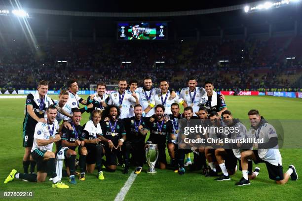 The Real Madrid team celebrate their win after the UEFA Super Cup match between Real Madrid and Manchester United at National Arena Filip II...