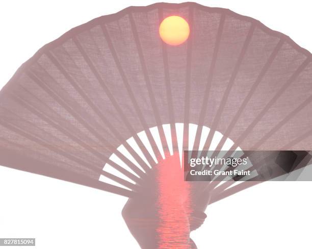 asian fan and sunrise combo. - first exposure series stock pictures, royalty-free photos & images