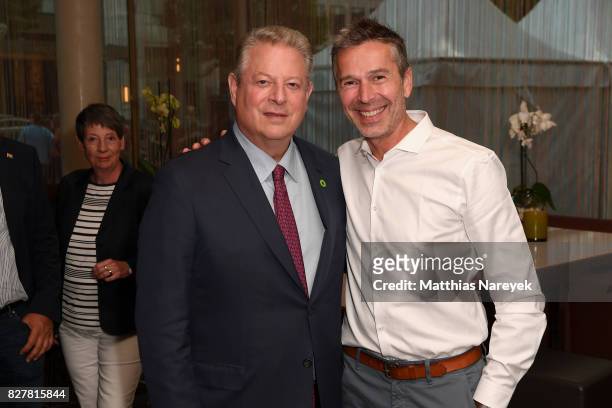 Former Vice President Al Gore and Dirk Steffens attend a special screening of 'An Inconvenient Sequel: Truth to Power' at Zoo Palast on August 8,...