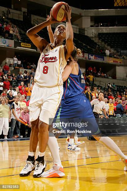 Tammy Sutton-Brown of the Indiana Fever shoots over a New York Liberty defender at Conseco Fieldhouse on September 11, 2008 in Indianapolis, Indiana....