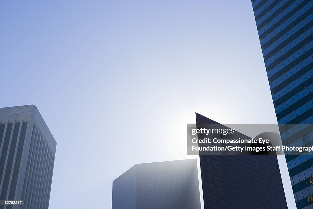 Skyline with building eclipsing the sun