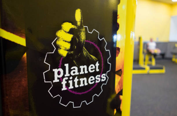 Woman leg lifts at Planet Fitness in the Columbia Mall on July 24, 2017 in Bloomsburg, Pennsylvania. - Mall space is being repurposed as more...