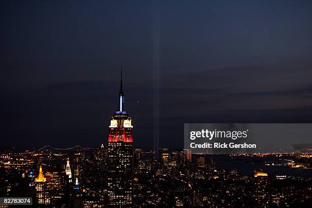 The sun sets on the Tribute in Light on the evening of the anniversary of the attacks on the World Trade Towers September 11, 2008 in New York City....