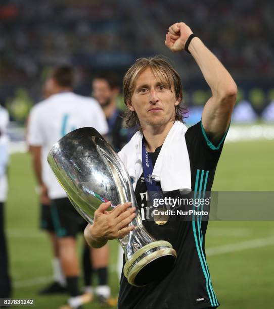 Luka Modric of Real Madrid poses for a picture with his trophy after winning the UEFA Super Cup football match between Real Madrid and Manchester...