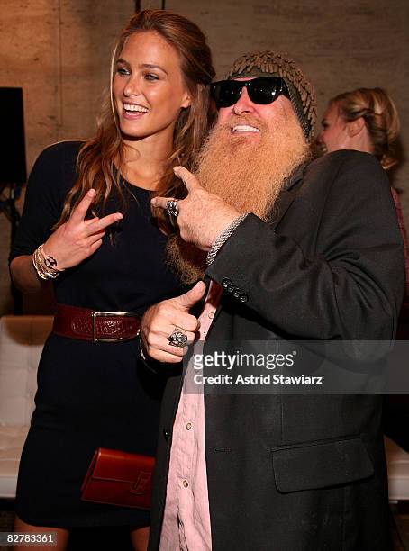 Model Bar Refaeli and Billy Gibbons of ZZ Top pose backstage at the Tommy Hilfiger Spring 2009 fashion show during Mercedes-Benz Fashion Week at the...