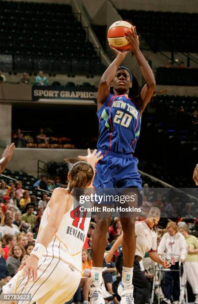 Shameka Christon of the New York Liberty shoots over Tully Bevilaqua of the Indiana Fever at Conseco Fieldhouse on September 11, 2008 in...