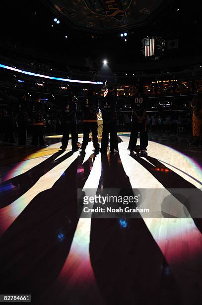 The Los Angeles Sparks stand on the court during the singing of the National Anthem before the game against the Atlanta Dream on September 11, 2008...