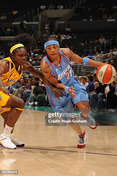 Marie Ferdinand-Harris of the Los Angeles Sparks guards against Betty Lennox of the Atlanta Dream on September 11, 2008 at Staples Center in Los...