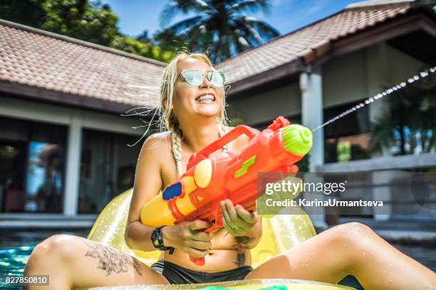 pool - songkran stock pictures, royalty-free photos & images