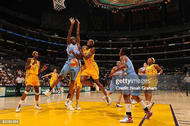 Delisha Milton-Jones of the Los Angeles Sparks collides with Kasha Terry of the Atlanta Dream on September 11, 2008 at Staples Center in Los Angeles,...