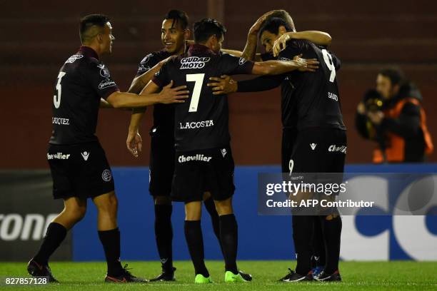 Argentina's Lanus forward Jose Sand celebrates with teammates after scoring against Bolivia's The Strongest during the Copa Libertadores 2017 round...