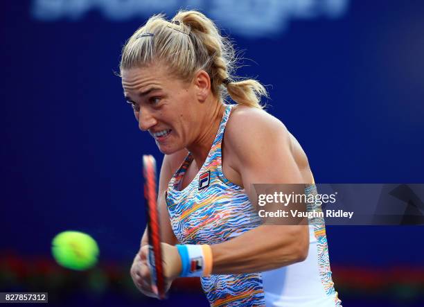 Timea Babos of Hungary plays a shot against Bianca Andreescu of Canada during Day 4 of the Rogers Cup at Aviva Centre on August 8, 2017 in Toronto,...