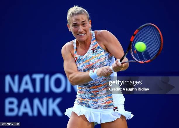 Timea Babos of Hungary plays a shot against Bianca Andreescu of Canada during Day 4 of the Rogers Cup at Aviva Centre on August 8, 2017 in Toronto,...