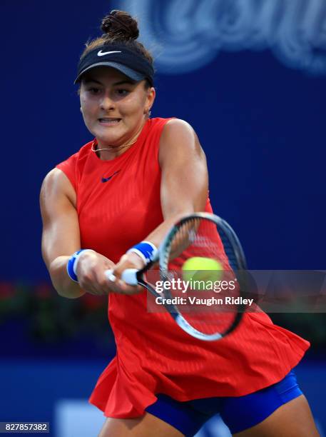 Bianca Andreescu of Canada plays a shot against Timea Babos of Hungary during Day 4 of the Rogers Cup at Aviva Centre on August 8, 2017 in Toronto,...