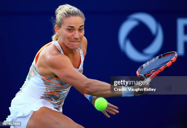 Timea Babos of Hungary plays a shot against Bianca Andreescu of Canada during Day 4 of the Rogers Cup at Aviva Centre on August 8, 2017 in Toronto,...