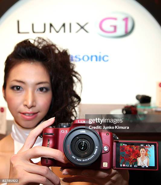 Matsushita Electric Industrial Co., Ltd's world's smallest new single-lens reflex camera Lumix G1 is on display during a press conference at Izumi...