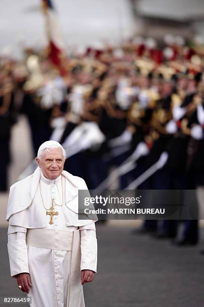 Pope Benedict XVI arrives at Orly airport, south of Paris, on September 12, 2008 for his first visit to France to bond with the Catholic church's...