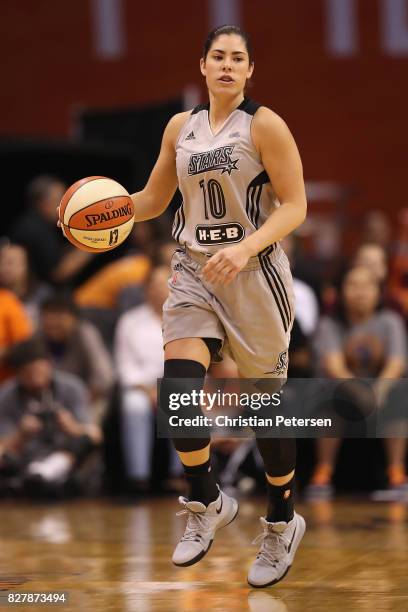 Kelsey Plum of the San Antonio Stars handles the ball during the WNBA game against the Phoenix Mercury at Talking Stick Resort Arena on July 30, 2017...