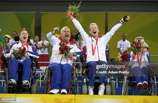 David Smith, Nigel Murray, Dan Bentley and Zoe Robinson of Great Britain celebrate winning Gold in the Boccia final between Great Britain and...