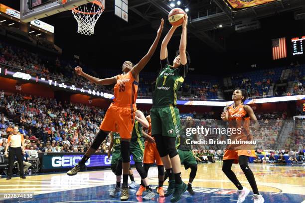 Jonquel Jones of the Connecticut Sun blocks the shot against Ramu Tokashiki of the Seattle Storm on August 8, 2017 at the Mohegan Sun Arena in...