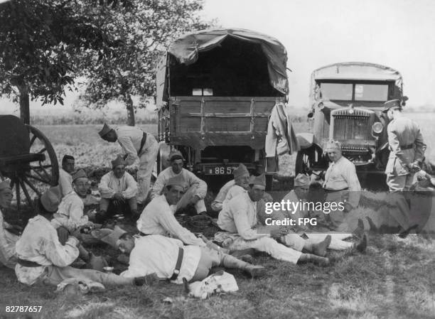 French soldiers take a break whilst carrying out anti-aircraft manoeuvres at Bourges, 25th August 1936.
