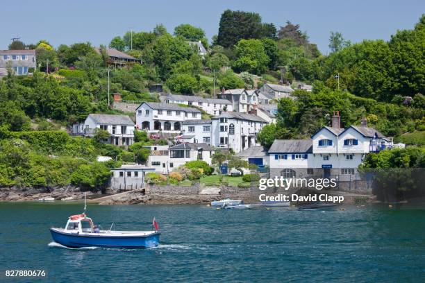 a boat sailing on the fowey river - fowey stock-fotos und bilder