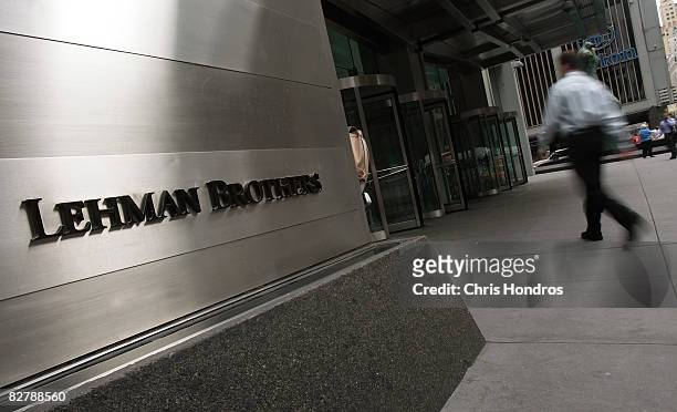 Man enters an annex office for Lehman Brothers September 12, 2008 in New York. The no. 4 U.S. Investment bank is currently searching Wall Street for...