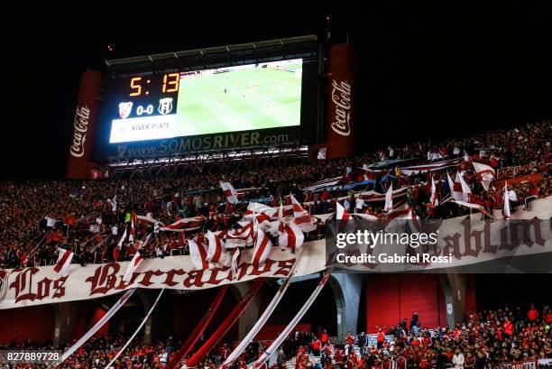 Fans of River Plate cheers for their team during a second leg match between River Plate and Guarani as part of round of 16 of Copa CONMEBOL...