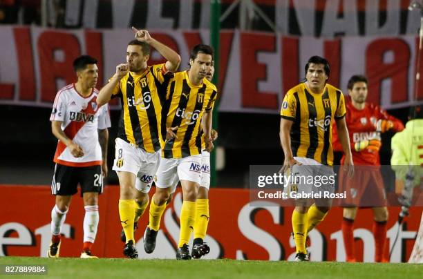 Marcelo Palau of Guarani celebrates with teammates after scoring the first goal of his team during a second leg match between River Plate and Guarani...