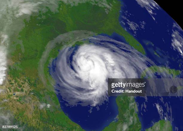 In this handout from the National Oceanic and Atmospheric Administration , Hurricane Ike is seen as it churns in the Gulf of Mexico September 12,...