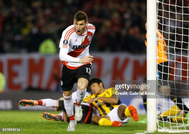 Lucas Alario of River Plate celebrates after scoring the first goal of his team during a second leg match between River Plate and Guarani as part of...