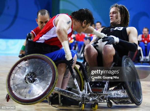 Jason Roberts of Great Britain and Daniel Buckingham of New Zealand in the Wheelchair Rugby match between Great Britain and New Zealand at Beijing...