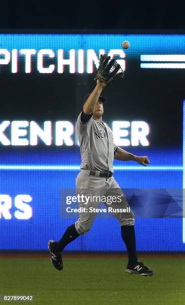 New York Yankees left fielder Brett Gardner makes a catch on an eighth inning pop up by Toronto Blue Jays second baseman Darwin Barney as the Toronto...