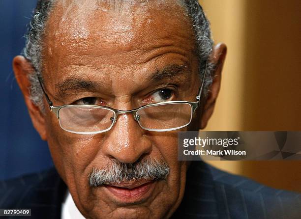 House Judiciary Chairman John Conyers talks about helping hurricane ravaged Haiti during a news conference on Capitol Hill September 10, 2008 in...