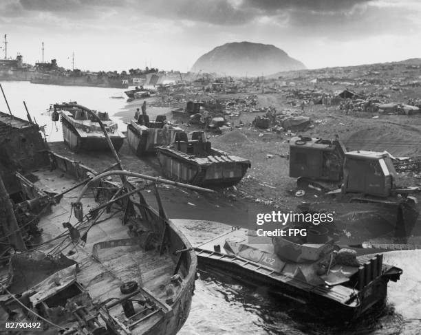 American landing craft and armoured vehicles on a beach during the Battle of Iwo Jima, February 1945.