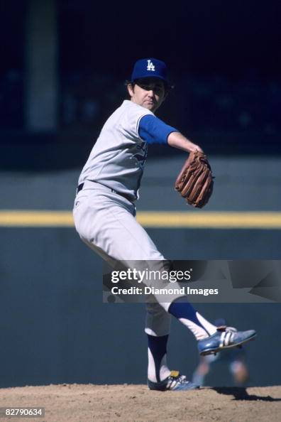 Pitcher Doug Rau of the Los Angeles Dodgers throws a pitch during ...