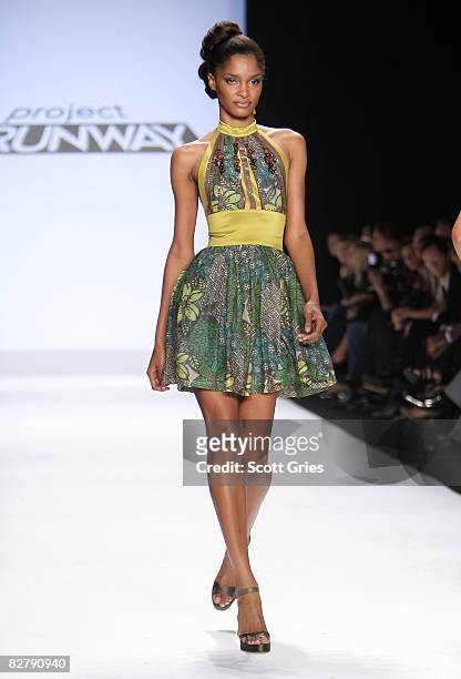 Model walks the runway wearing a Korto Momolu design at the Project Runway Finalists Fashion Show Spring 2009 fashion show during Mercedes-Benz...