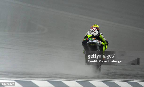 Valentino Rossi of Italy rides the Fiat Yamaha during practice for the MotoGP Red Bull Indianapolis Grand Prix at the Indianapolis Motor Speedway on...