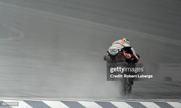 Alex De Angelis of San Marino rides the San Carlo Gresini Honda during practice for the MotoGP Red Bull Indianapolis Grand Prix at the Indianapolis...