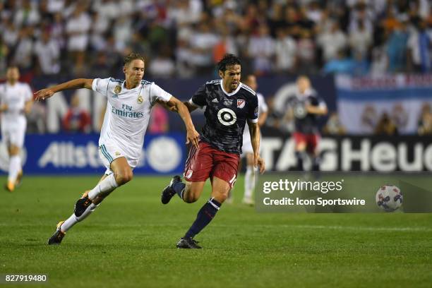 All-Star Kaka and Real Madrid midfielder Marcos Llorente battle for the ball in the first half during a soccer match between the MLS All-Stars and...